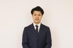 吉田泰智の人物画像