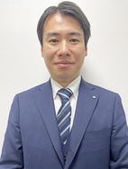 関稔覚の人物画像