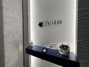 株式会社ウィズダムの店舗内観の写真